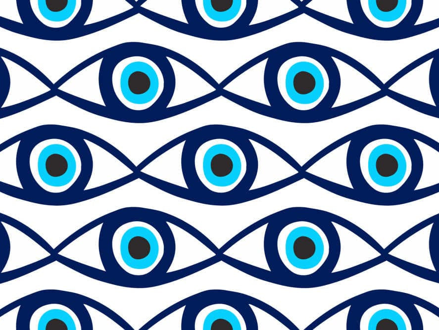 Image by Arina Ulyasheva via Shutterstock - seamless pattern with evil eyes