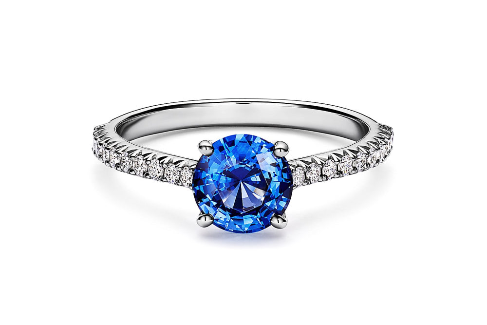 Image via Tiffany - round sapphire platinum ring